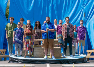 Scene from Children of Eden: Noah's family and the Storytellers sing "The Gathering Storm"
